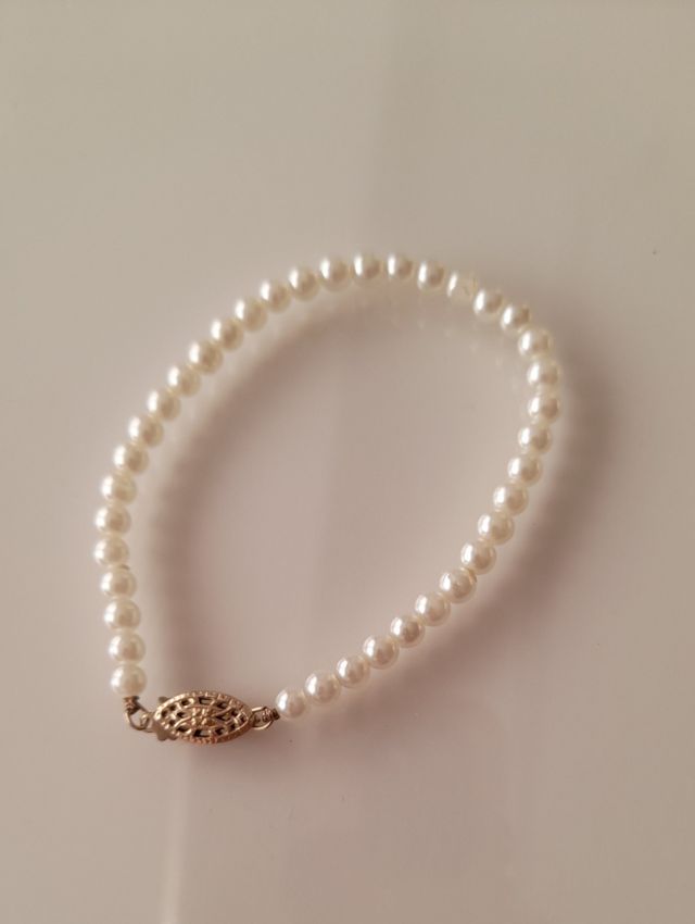 Pulsera perlas naturales .
