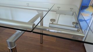 Mesa de cristal y acero extensible 2 m.