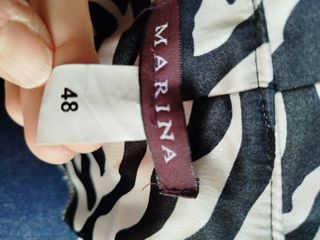 Blusa bicolor estampada animal print talla 48