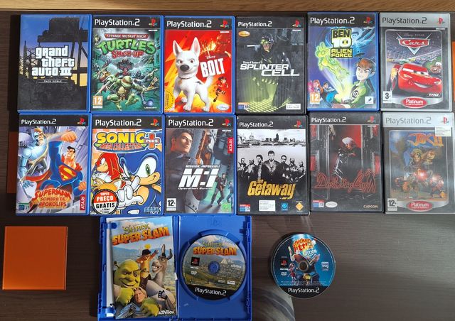 PlayStation 2, dos mandos, 14 juegos.