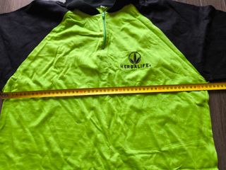 Camiseta de Herbalife.Cuelga móvil de regalo