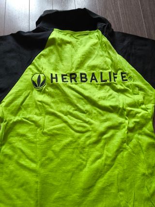 Camiseta de Herbalife .Cuelga móvil de regalo