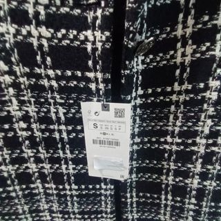 Abrigo Zara blanco y negro