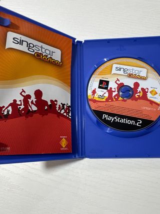 Lote juegos singstar PS2 con micros