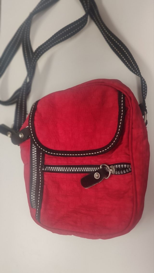 Bolsito mariconera rojo