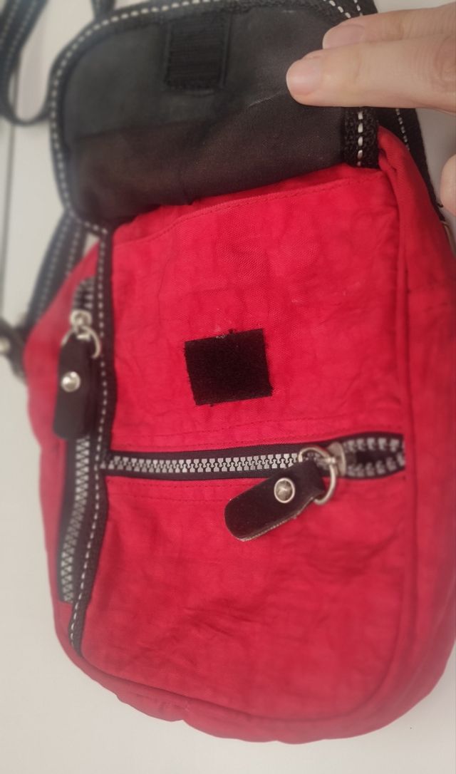 Bolsito mariconera rojo