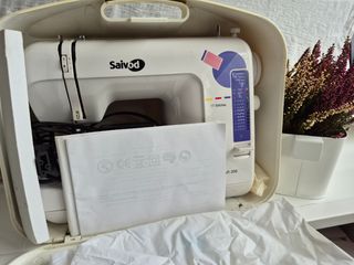 Maquina de coser saivod
