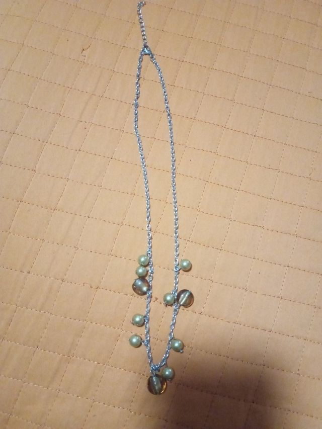 Conjunto de collar pendiente y pulsera