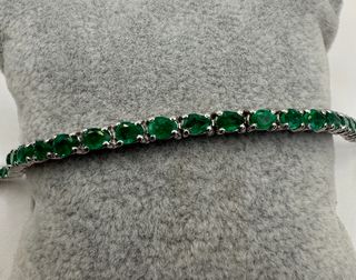 Pulsera de oro blanco de 18 kt con esmeraldas