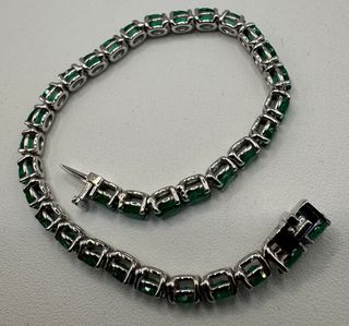 Pulsera de oro blanco de 18 kt con esmeraldas