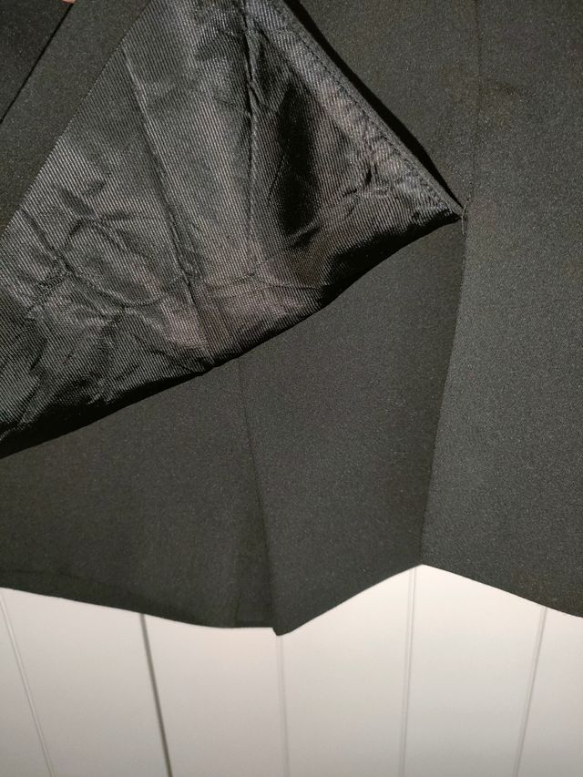 Falta pantalón negra