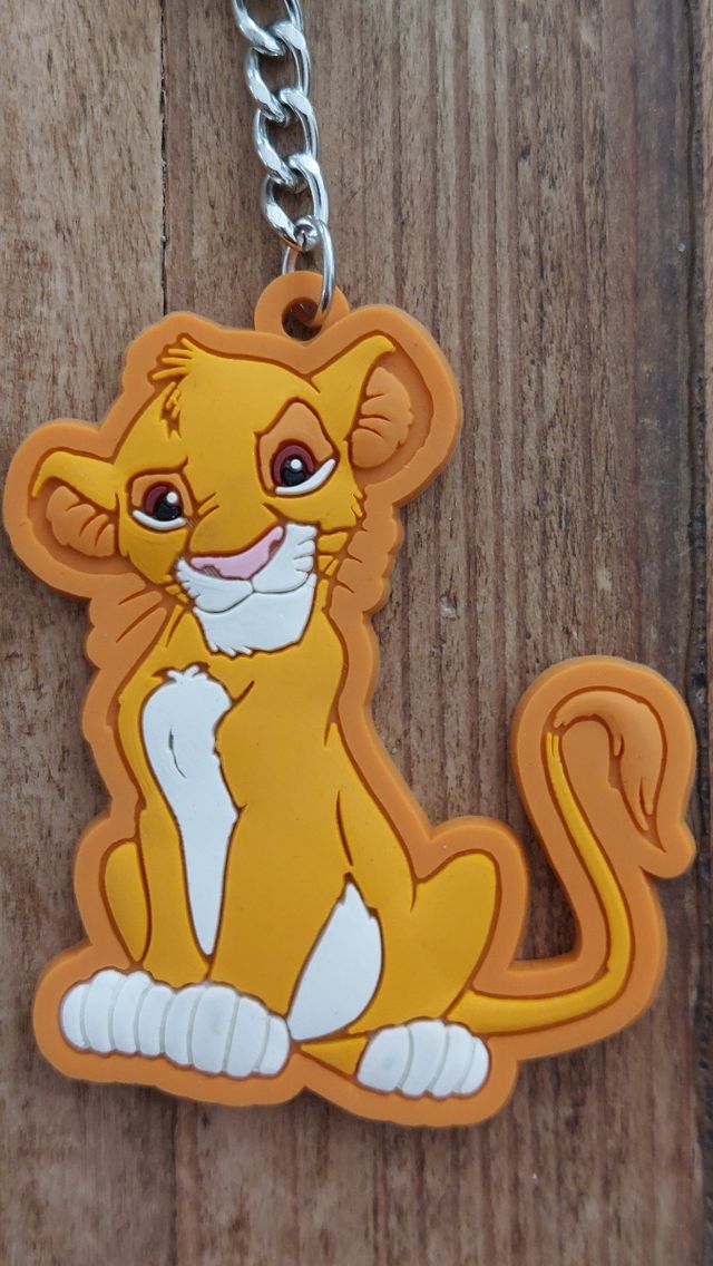 4 llaveros Disney Mickey, Minnie, Simba,