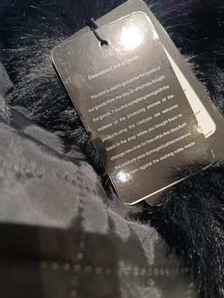 Chaquetón negro nuevo con etiquetas