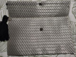 Bolso mano plateado
