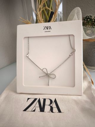 Collar lazo joya Zara, color plata,nuevo
