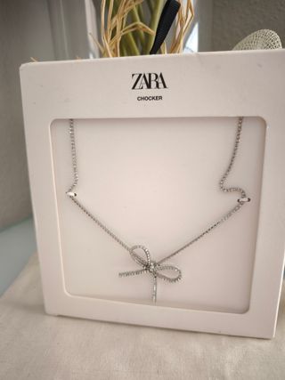Collar lazo joya Zara, color plata,nuevo
