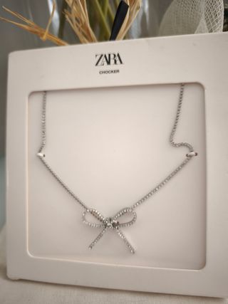 Collar lazo joya Zara, color plata,nuevo