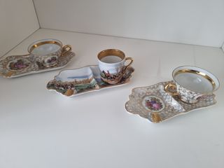 3 tazas con su bandeja de porcelana.