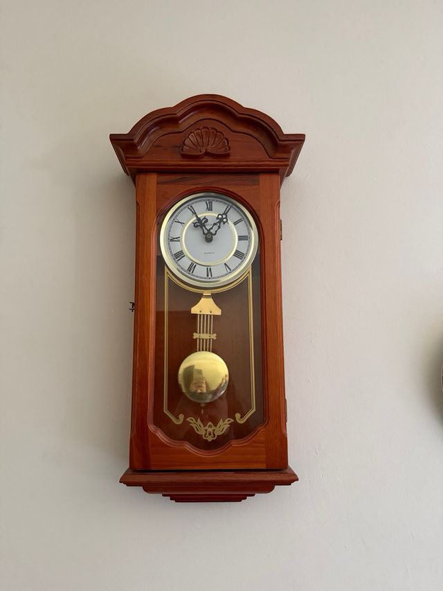 Reloj con pendulo de pared Longchamp madera