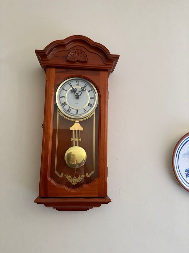 Reloj con pendulo de pared Longchamp madera