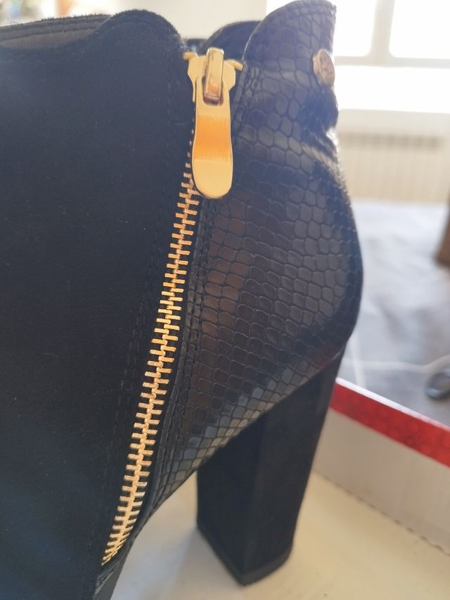 Botas con tacón elegantes