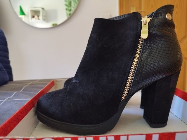 Botas con tacón elegantes