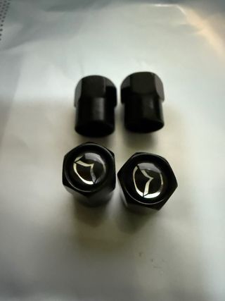 Tapones valvula Mazda negros NUEVOS