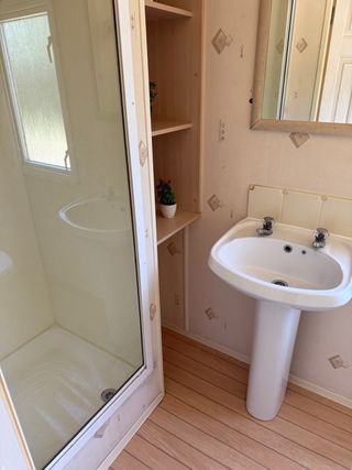 CASA MOVIL 11x4 m 2 DORMITORIOS SUELO TARIMA