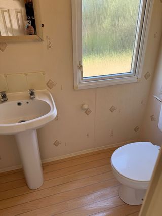 CASA MOVIL 11x4 m 2 DORMITORIOS SUELO TARIMA