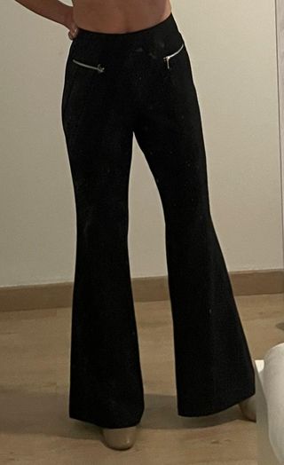 Traje chaqueta pantalón.