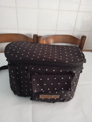 Bolso de coche de paseo y botas de niño