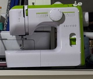 Maquina de coser saivod