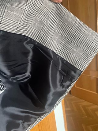 Abrigo paño de cuadros.