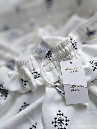 Pantalón fluído acampanado mujer