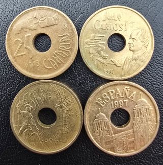  7 monedas mas 4 de 25 pts con agujero.