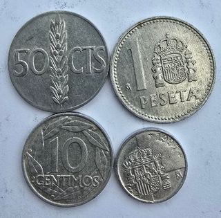  7 monedas mas 4 de 25 pts con agujero.