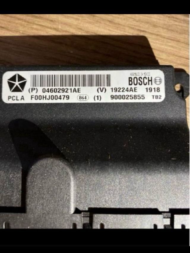 Módulo control puerta del izq Chrysler