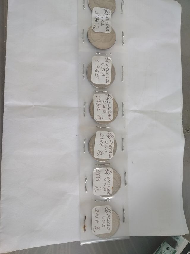 7 moedas de 0,25 de dollar 