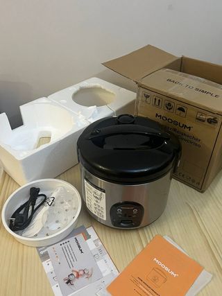 Moosum electric Rice cooker .