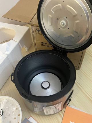 Moosum electric Rice cooker .