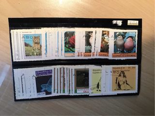 Francobolli Tematici gatti uccelli nudi, farfalle