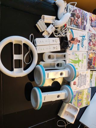 Wii con ,100 juegos , wii fit plus y...