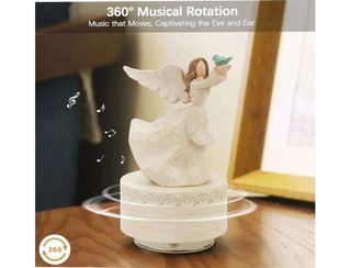 Caja musical giratoria rosa