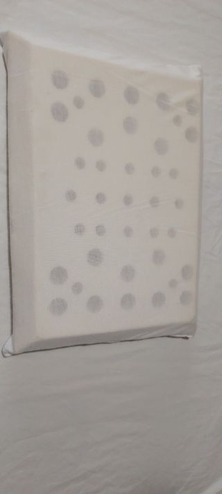 Almohada ergonómica de bebé