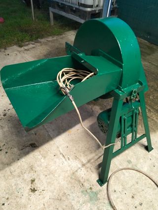 Maquina de triturar maíz.