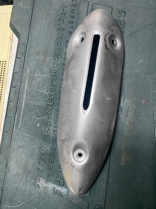Embellecedor escape peugeot V-clic