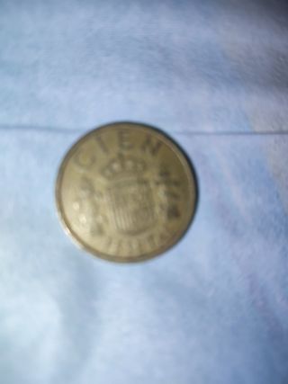 Moneda de cien pesetas negociable