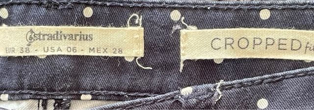 Pantalon topitos blancos Stradivarius