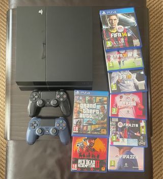 Playstation 4 negra + 2 mandos + juegos