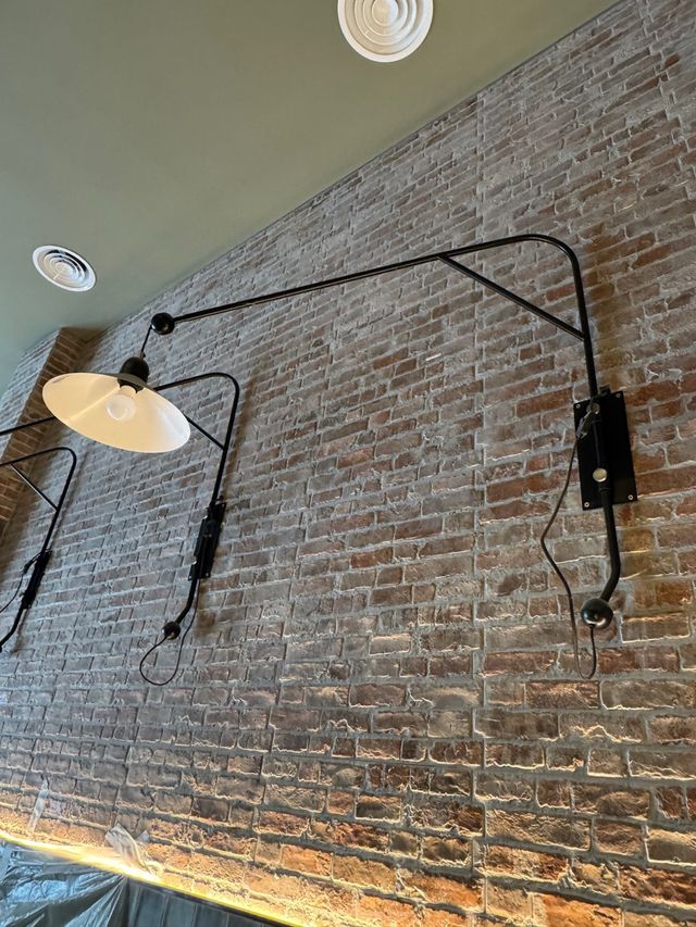 Aplique de pared Eleazar de metal acabado negro